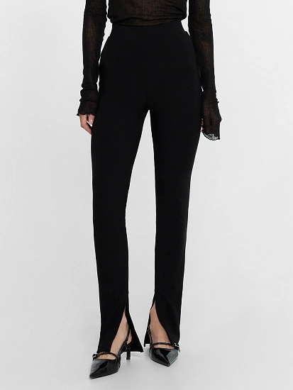 картинка Брюки женские клеш с разрезами черные от магазина стильной одежды Mark Formelle