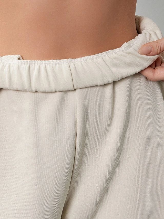 Брюки женские в бело-бежевом цвете - 7