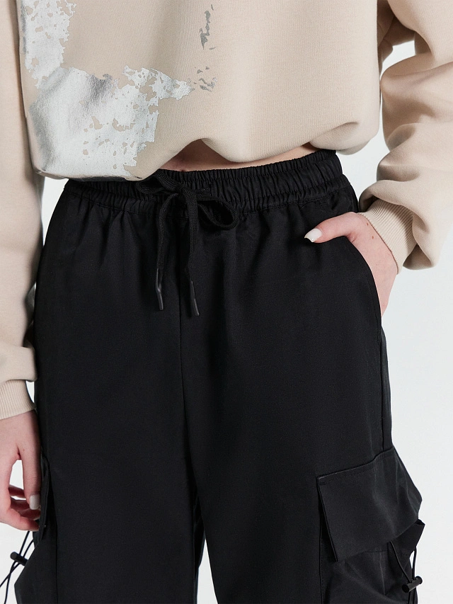 Брюки женские в черном цвете - 6