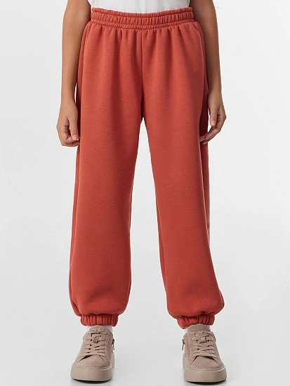 картинка Брюки для девочек оранжевые от известного бренда одежды для девочек Mark Formelle