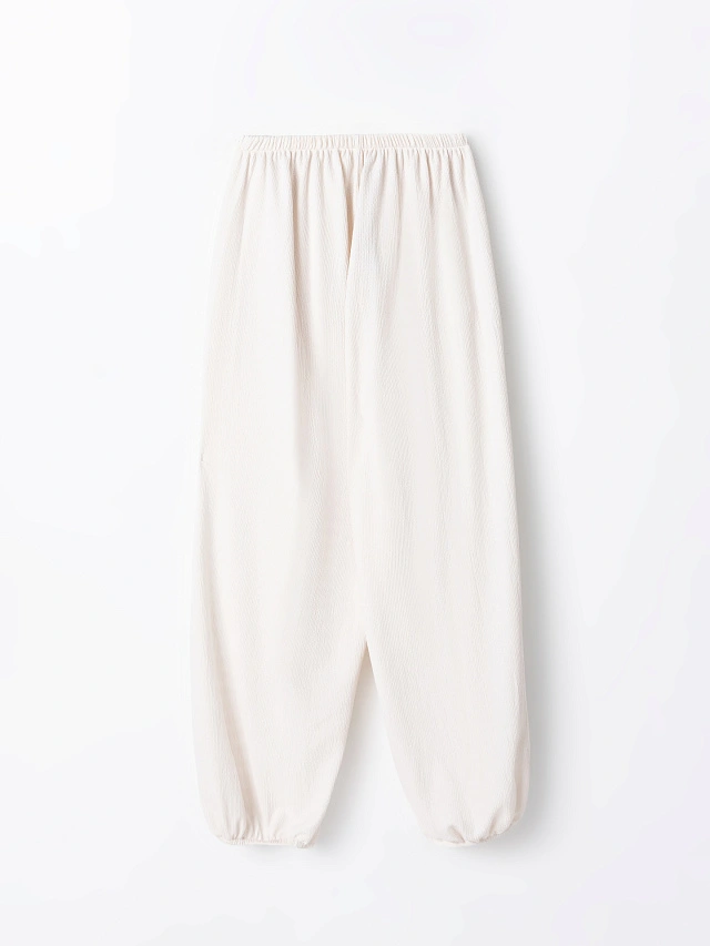 Брюки джоггеры женские молочные свободного кроя - 7