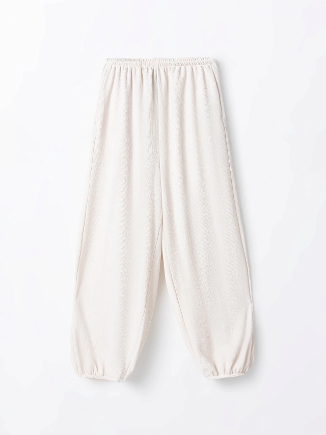 Брюки джоггеры женские молочные свободного кроя - 4